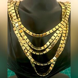 Kenneth Cole multi strand statement gold tone necklace
